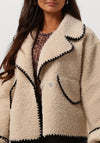 Teddy-Mantel für Damen – Oversize Wintermantel in Beige mit Schwarzen Akzenten