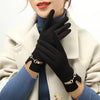 Elegante handschuhe - stilvolle damenhandschuhe mit goldfarbener hardware