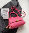 Stilvolle rosa handtasche – modisch und funktional